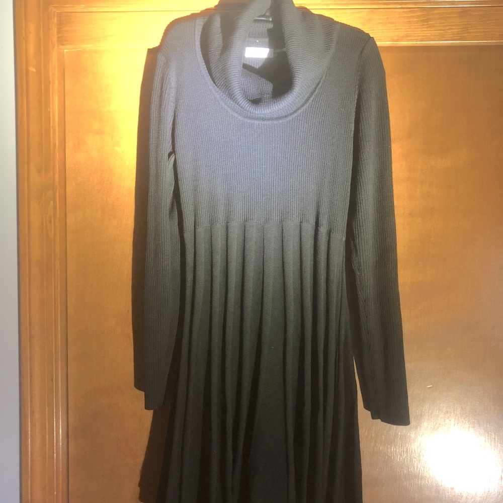 Like new CK long sleeve black sweater dress.